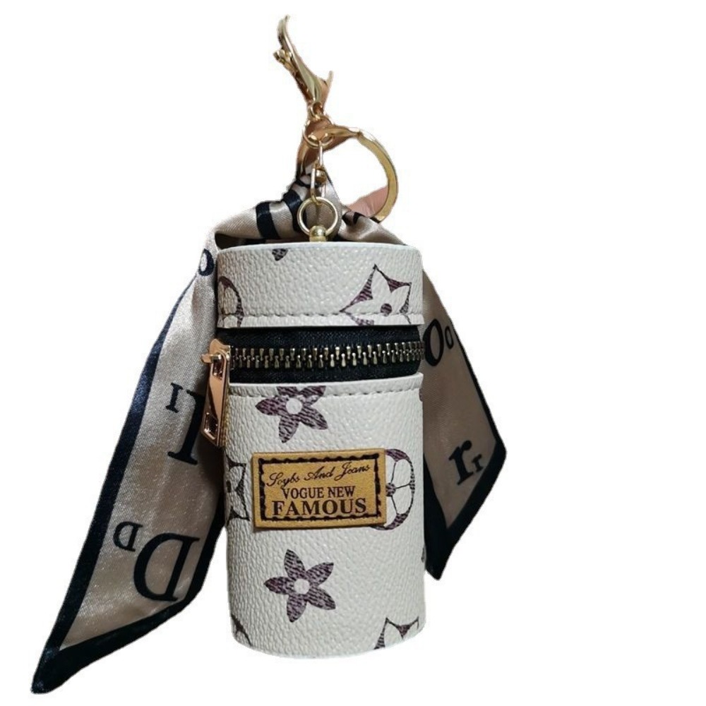 Off-White Floral Monogram Cyli - огляд і ціна Monogram Keychain Leather